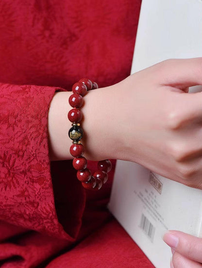 2025 Year of the Snake: Cinnabar Obsidian Guardian Buddha Bracelet – Luck and Protection.
