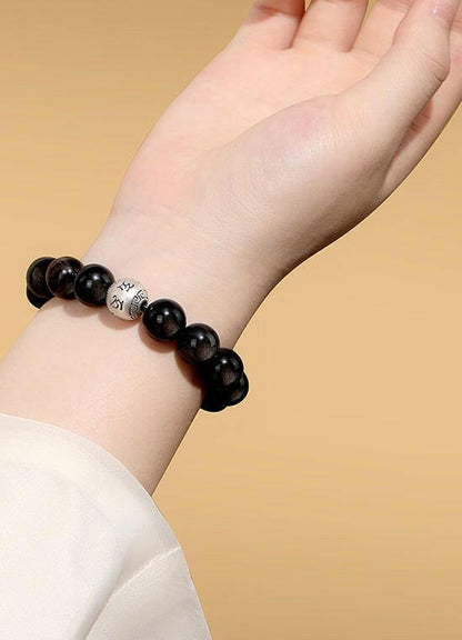 Natural Obsidian Six-Word Mantra Bracelet – Protection and Spiritual Wisdom.