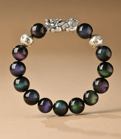 Natural Rainbow Obsidian Bracelet with Pixiu Charm for Wealth and Protection.