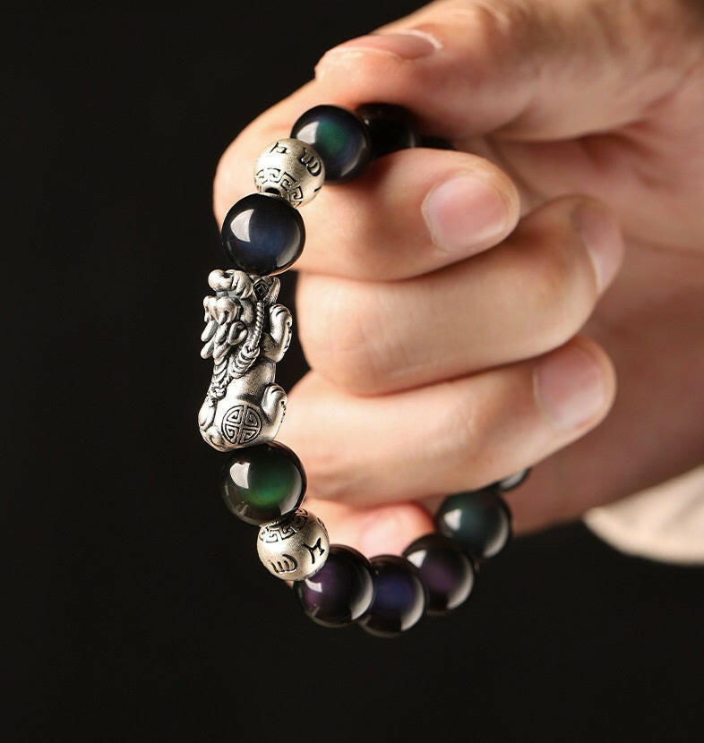 Natural Rainbow Obsidian Bracelet with Pixiu Charm for Wealth and Protection.